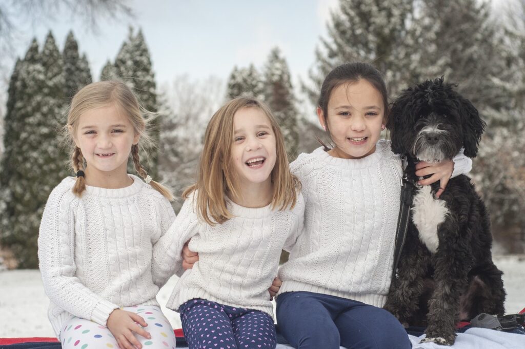 sisters, dog, snow